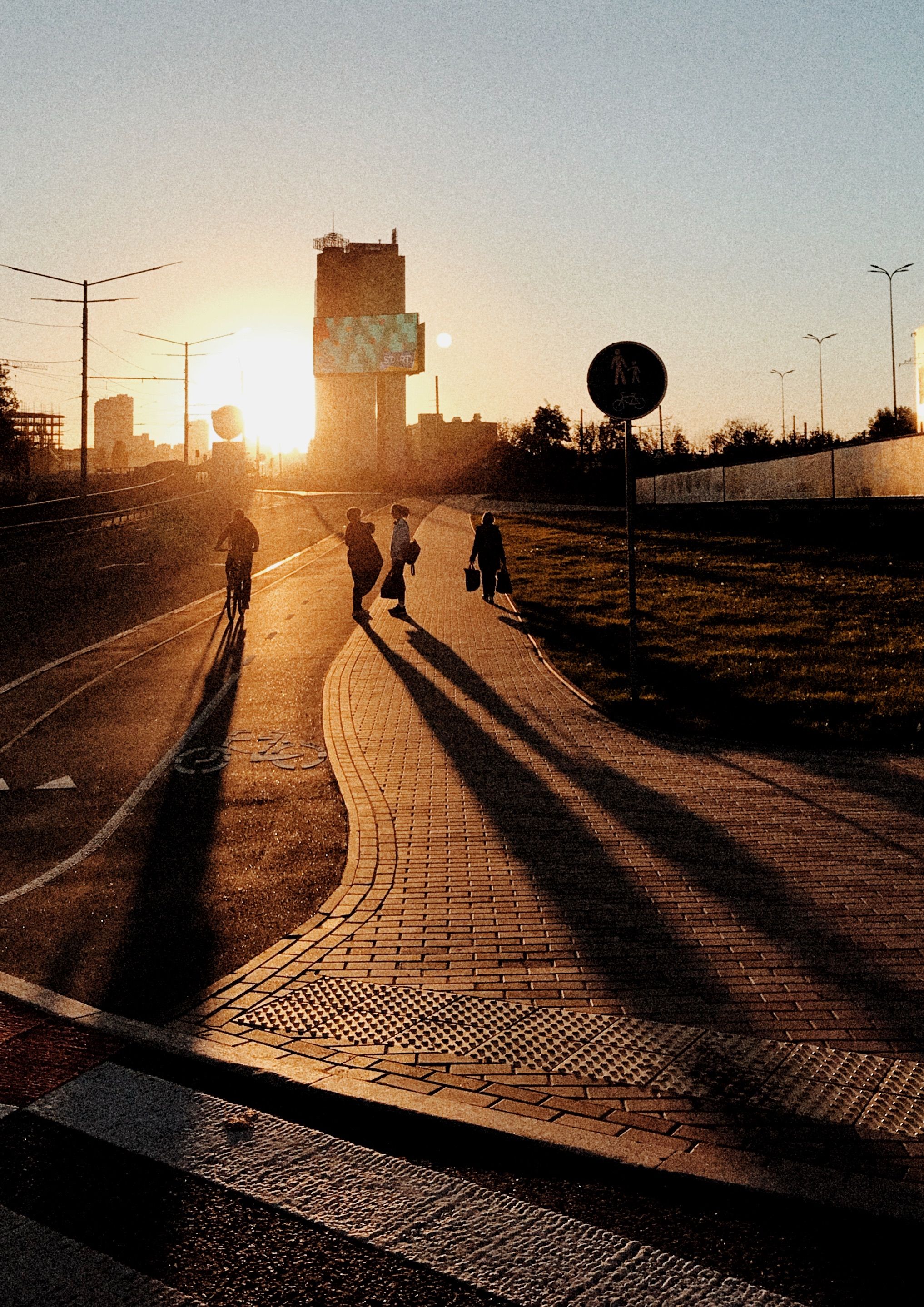 People Walking on the Road during Sunset · Free Stock Photo