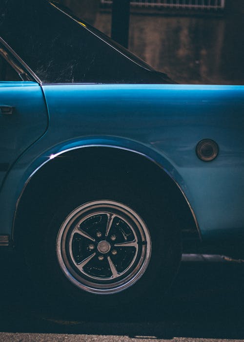 Blue Classic Car With Gray 5-spoke Wheel and Tire