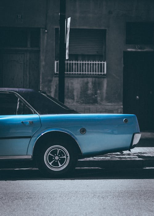 Free Classic Blue Sedan Parked On Roadside Stock Photo