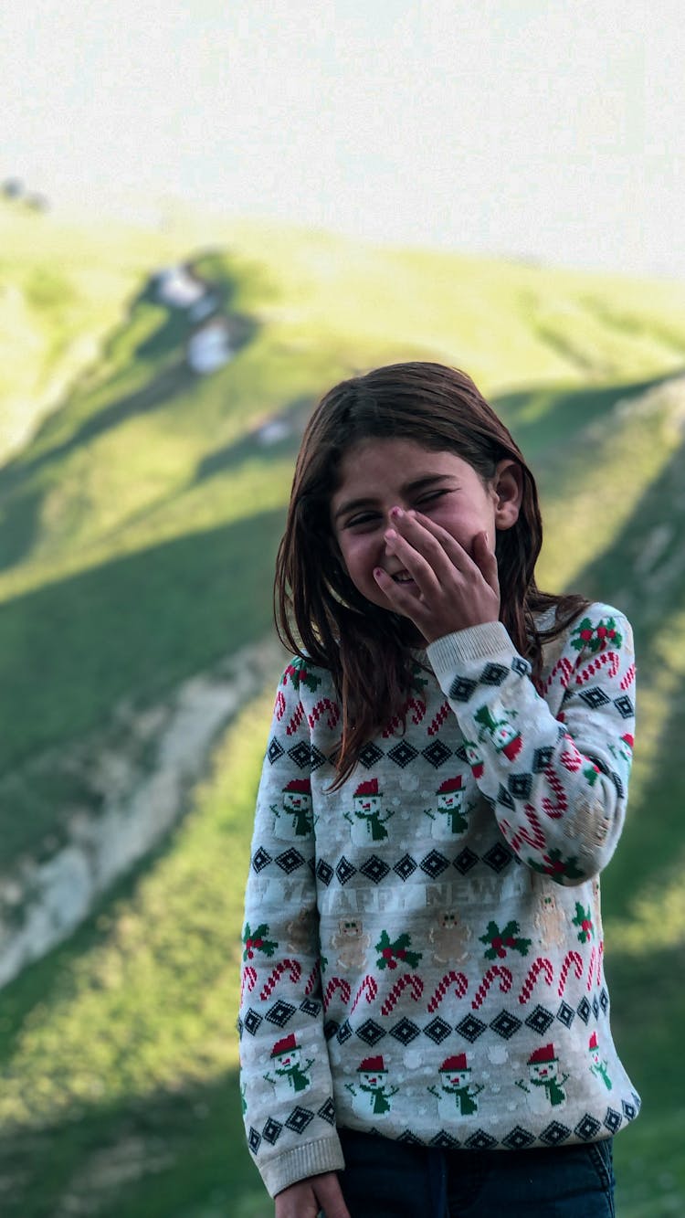 A Girl Wearing Sweater Laughing