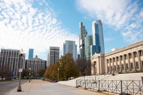 Free Vibrant view of Chicago's downtown skyline with iconic skyscrapers and historic architecture on a sunny day. Stock Photo
