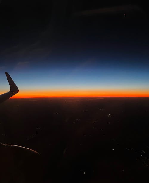 Foto profissional grátis de aeronave, lindo pôr do sol, noite do céu