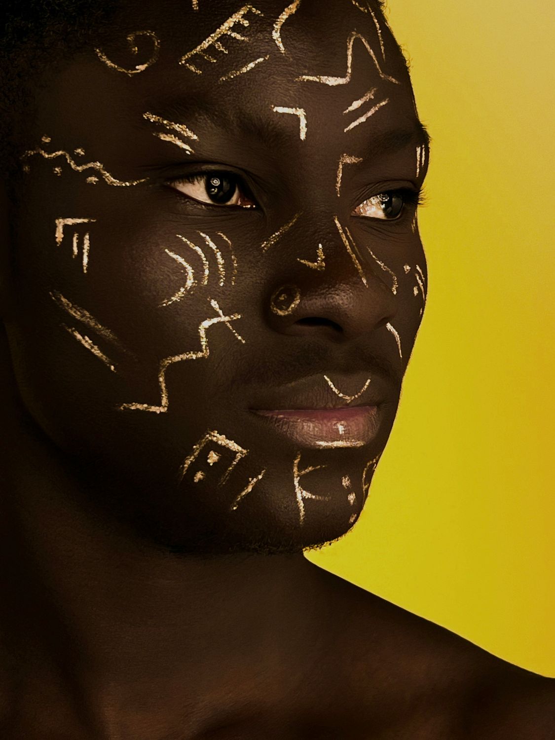 Portrait of a Man with Face Paint · Free Stock Photo