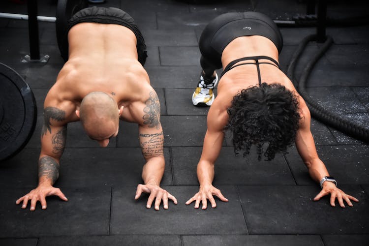 A Man And A Woman Working Out