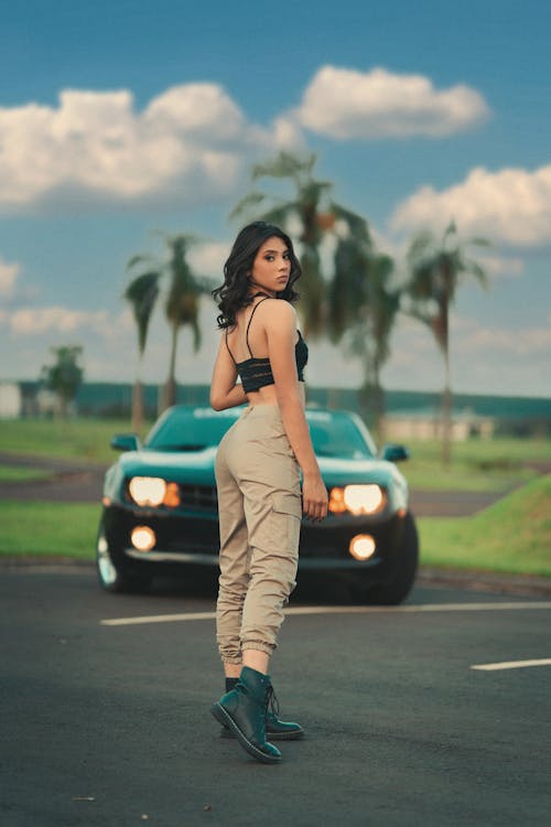 Woman in Black Top and Khaki Pants