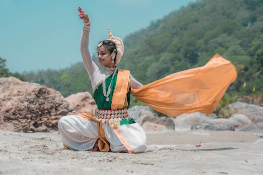 Beautiful Odissi dance performance captured outdoors in Puri, India.