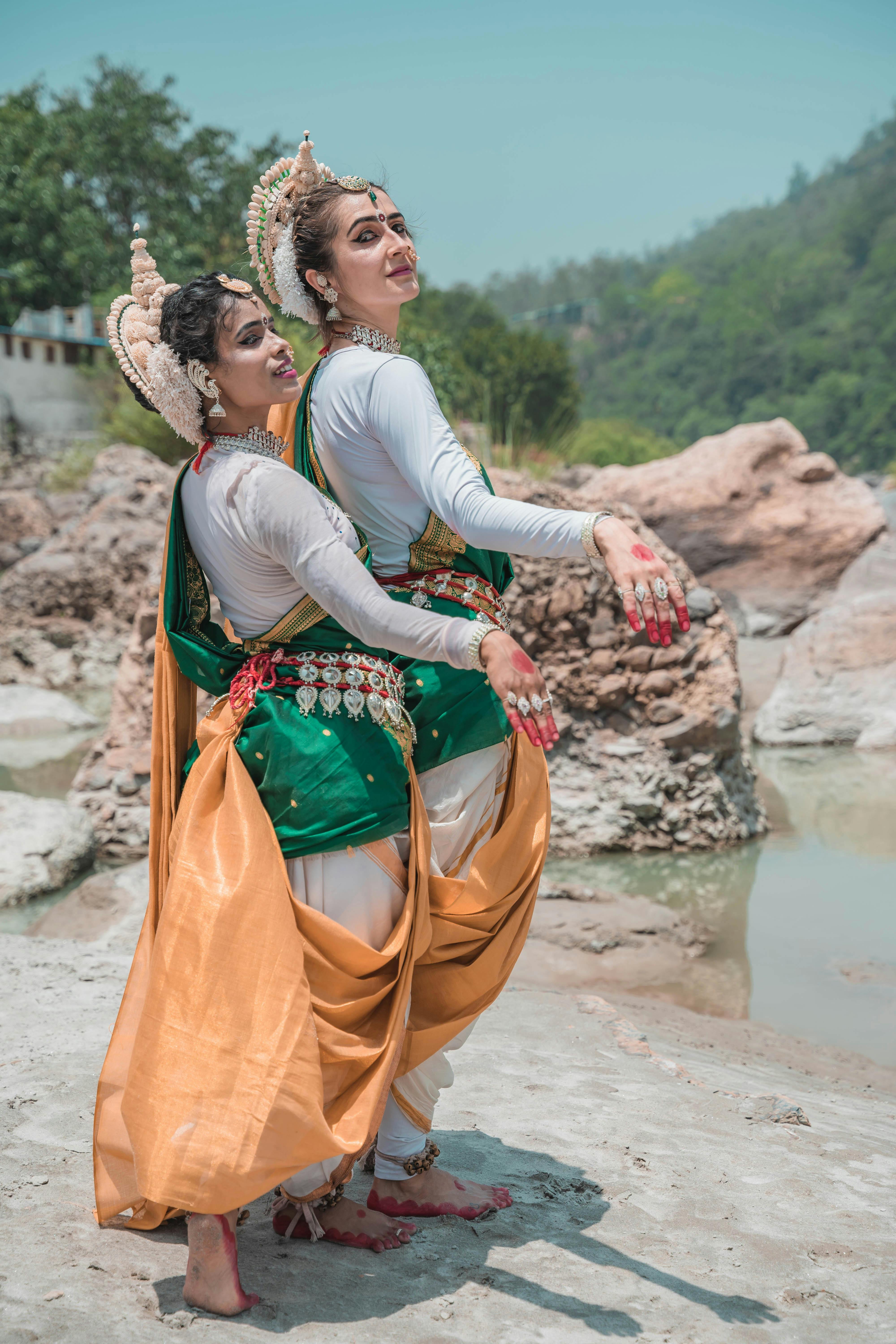 Multinational Group Of Beautiful Young Classical Odissi Dancers Wears  Traditional Costume And Posing Odissi Dance Mudra In The Rainforest. Stock  Photo, Picture and Royalty Free Image. Image 149604530.