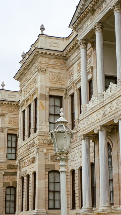 Free Architectural detail of Dolmabahçe Palace with ornate facade and columns, Istanbul, Turkey. Stock Photo