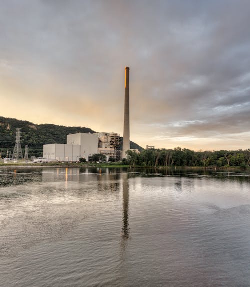 Factory Chimney Reflected in Lake