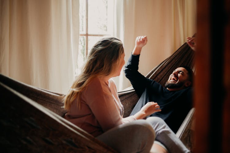 Happy Couple On A Hammock