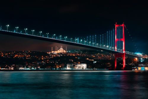Free Stunning nighttime view of the illuminated 15 July Martyrs Bridge in Istanbul, Turkey. Stock Photo