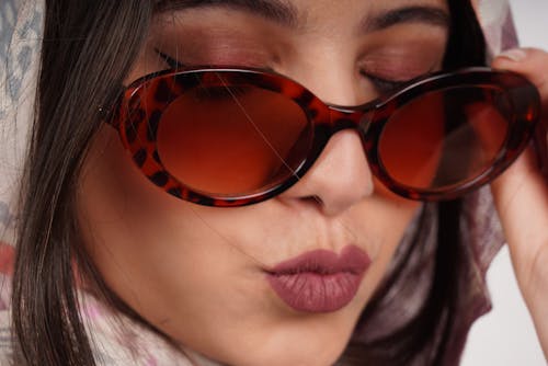 Close-Up Shot of a Woman With Sunglasses 