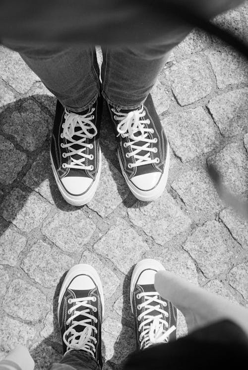 Grayscale Photography Of High-top Sneakers · Free Stock Photo