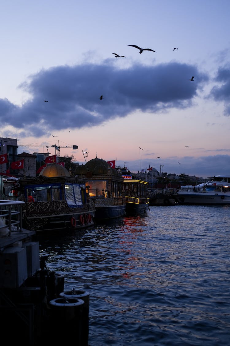 Boats In Harbor At Dawn