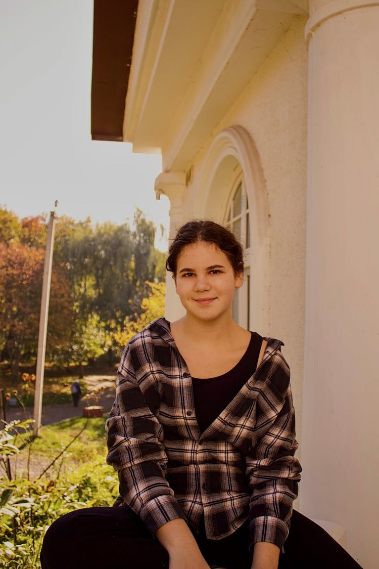 Teenager Wearing A Plaid Top