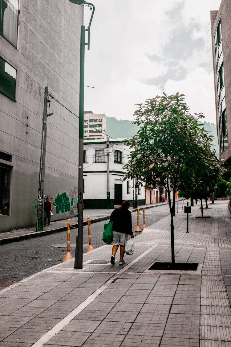 A Person Walking On The Street