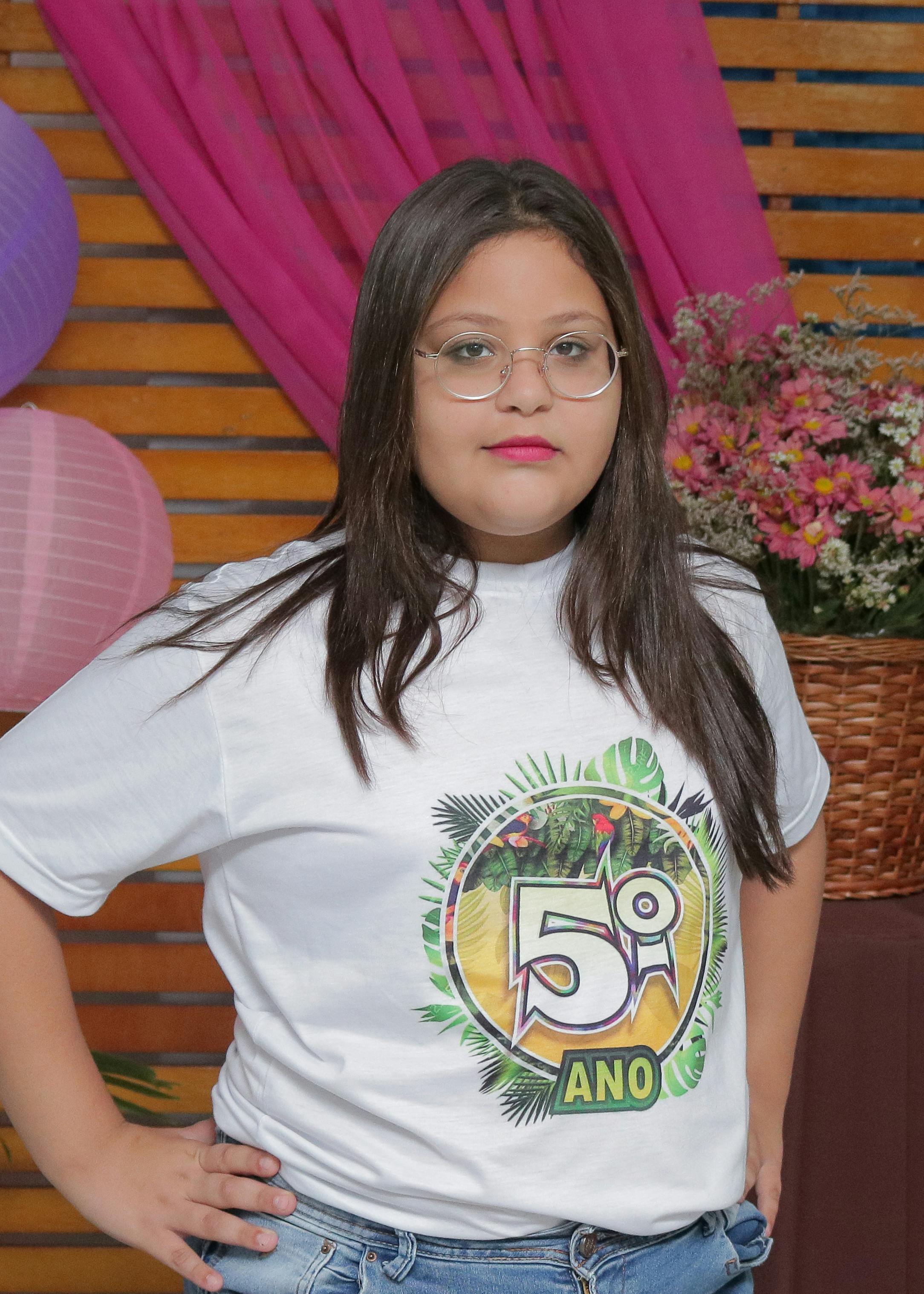 Confident young woman wearing glasses, celebrating a milestone.