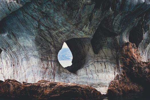 Explore the captivating marble cave with intricate formations and scenic view.