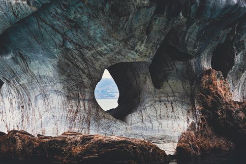 Free Explore the captivating marble cave with intricate formations and scenic view. Stock Photo