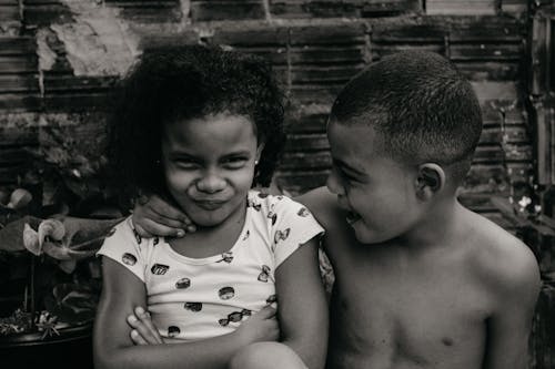 Grayscale Photo of Two Children