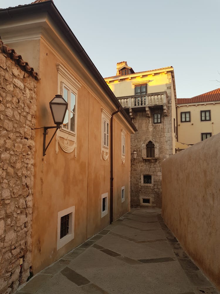 Passage Between Buildings And Wall