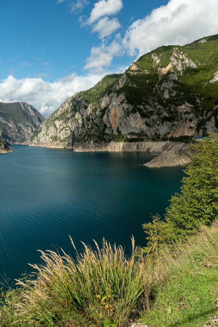 Placid Water Of A Lake Valley