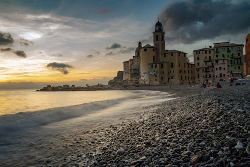 White and Brown Concrete Building Near Sea