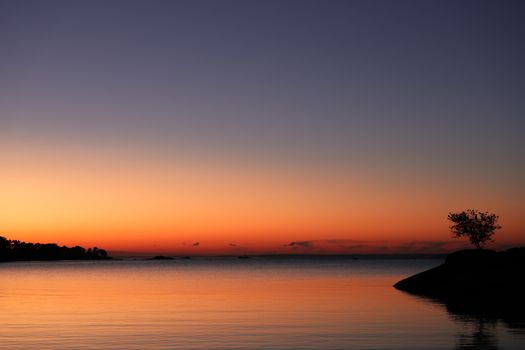 Serene sunset over a tranquil lake in Stamford, Connecticut, capturing nature's beauty.