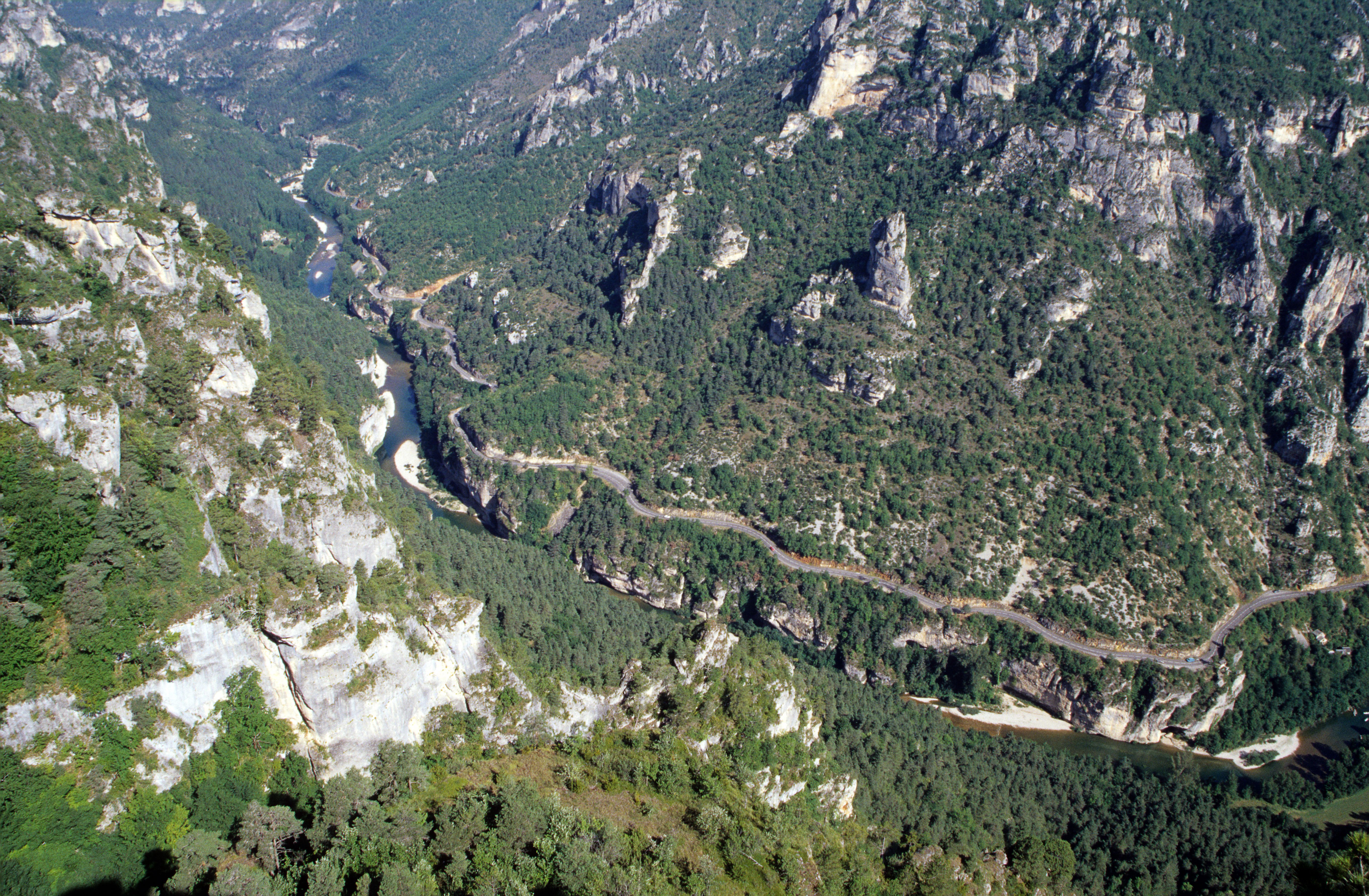 Stunning aerial view of Tarn Gorge with cliffs and river in La Malène, France.