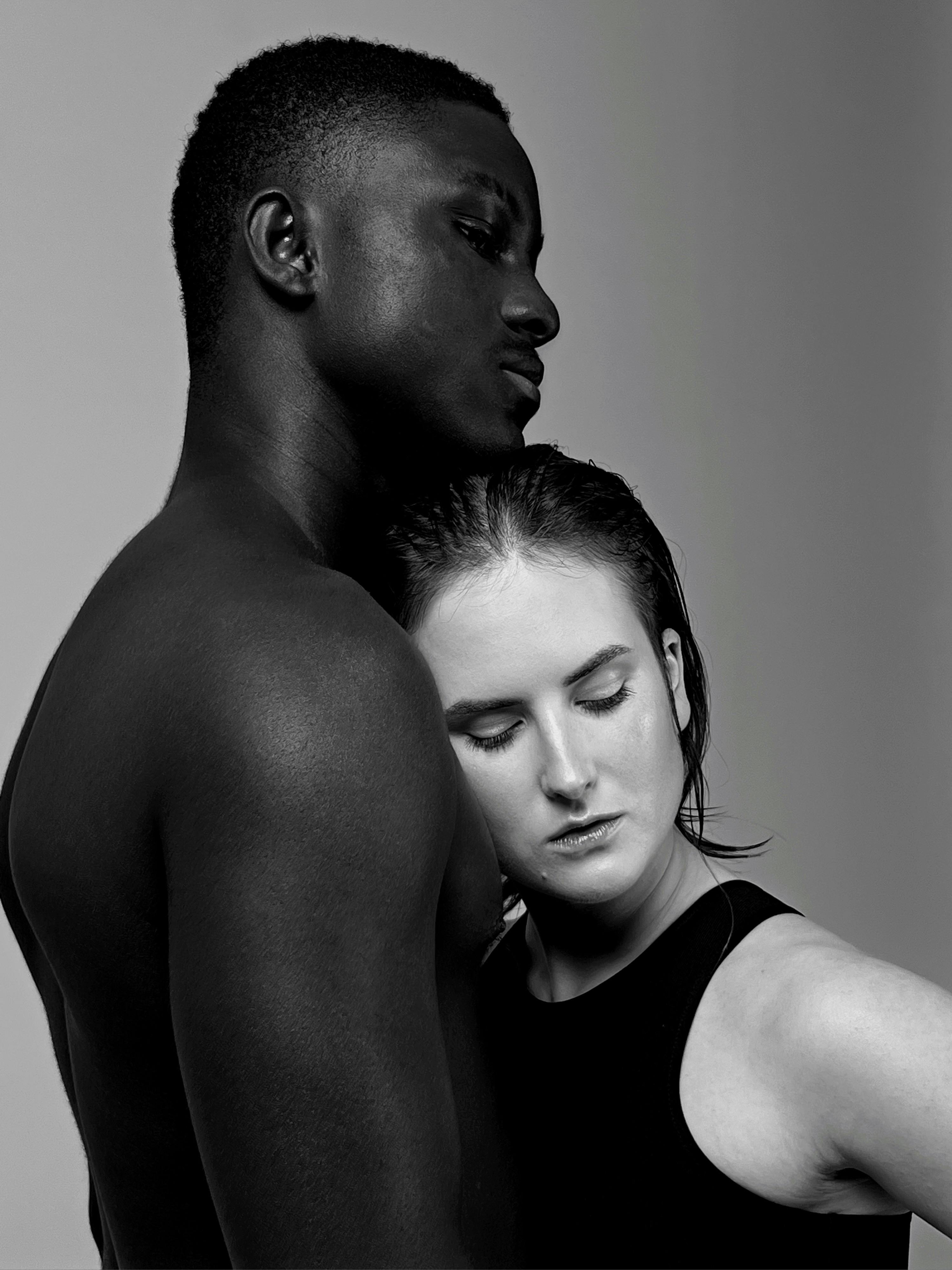 Studio Shoot of a Black Man and White Woman Embracing Each Other · Free  Stock Photo