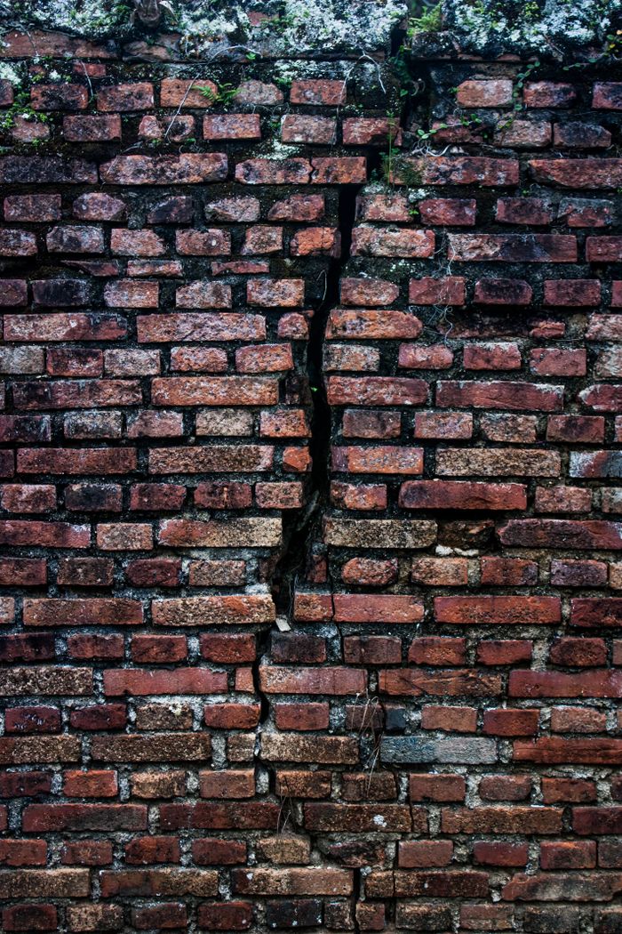 Example photo of cracks in a brick wall