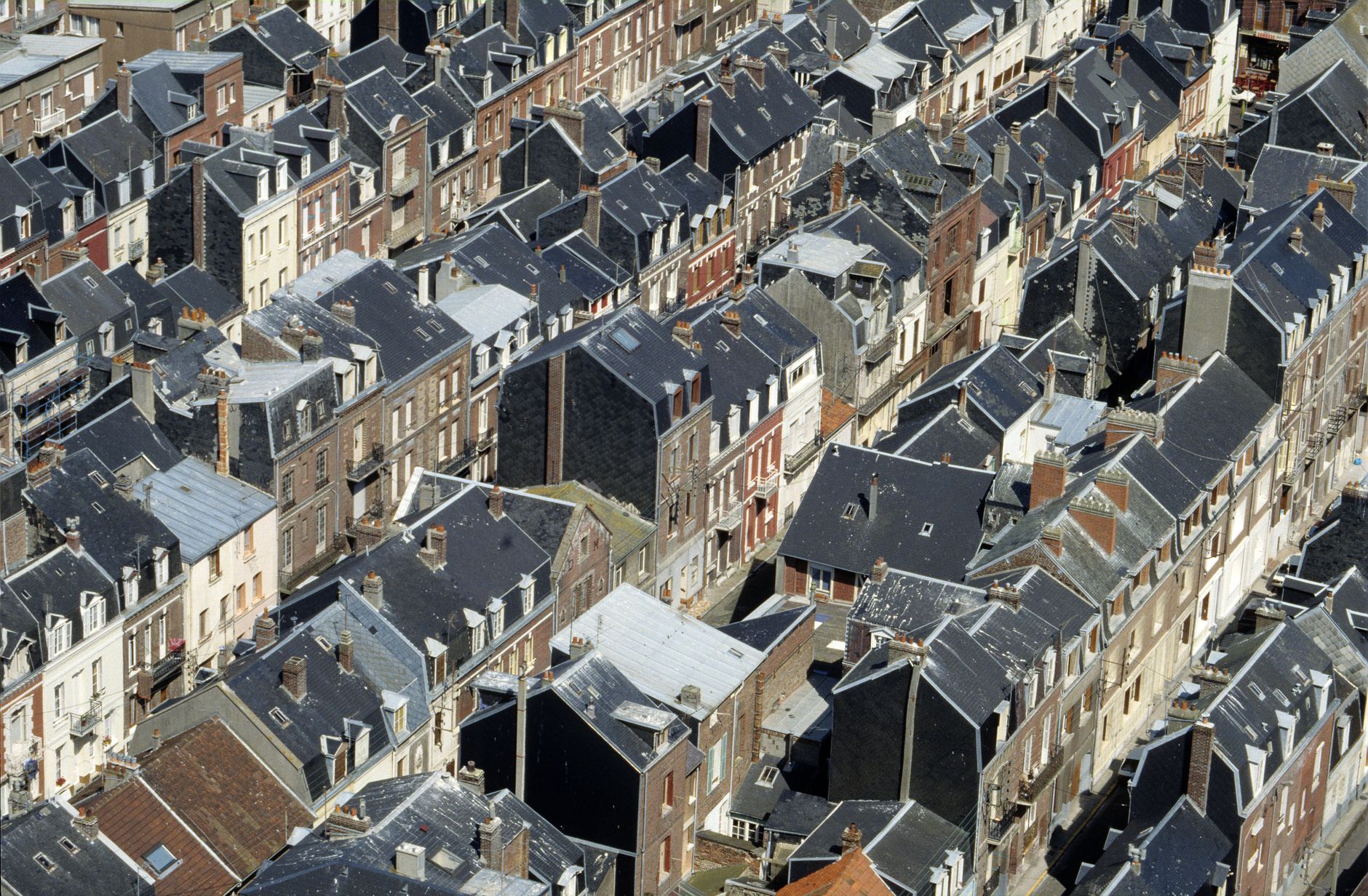 Aerial view showcasing the charming and historic rooftop architecture of Le Tréport, Normandie, France.