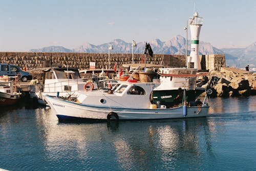 Free Fishing Boat in the Harbor  Stock Photo