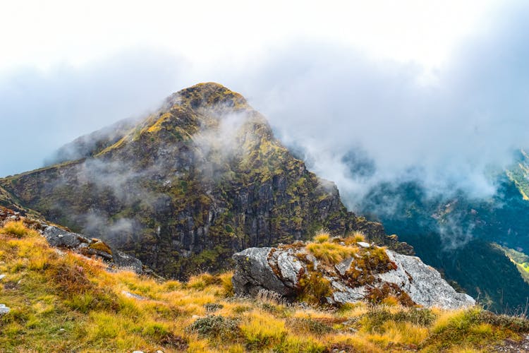 Gray And Green Mountain Near Grass Field