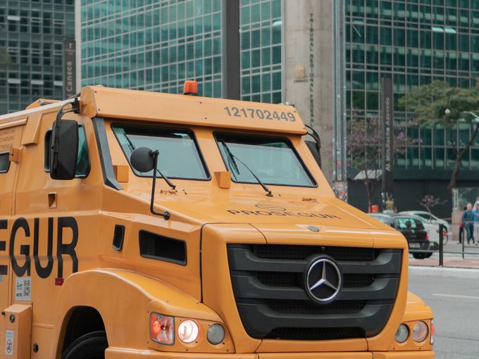 Armoured cash-in-transit vehicle parked on a city street
