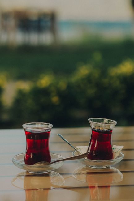 Two glasses of Turkish tea on an outdoor table in Sapanca, Turkey, capturing a serene and traditional moment.