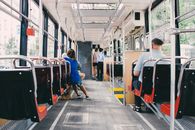 Unrecognizable passengers in modern bus during trip