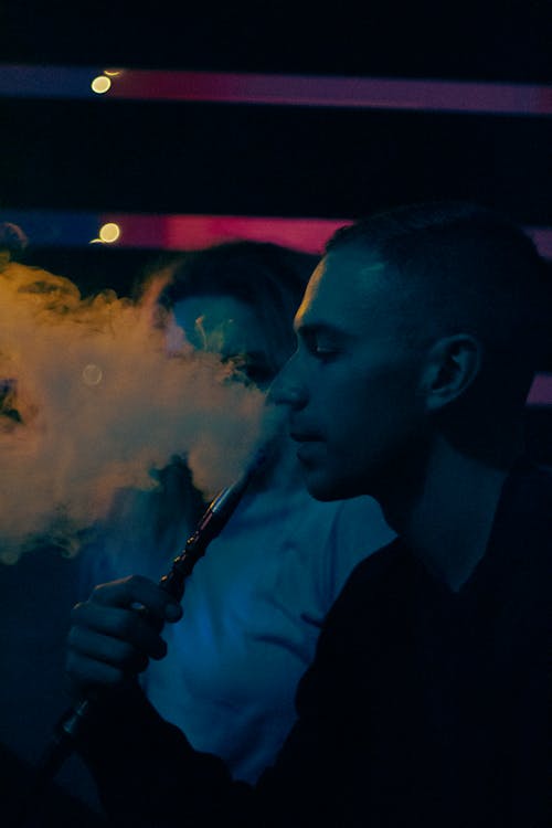 Man Smoking a Shisha