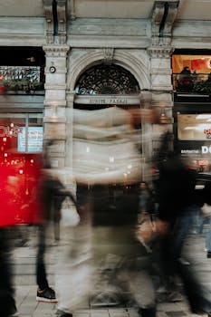 Dynamic blur of people walking past Suriye Pasaji in Istanbul, Turkey, capturing urban life motion.