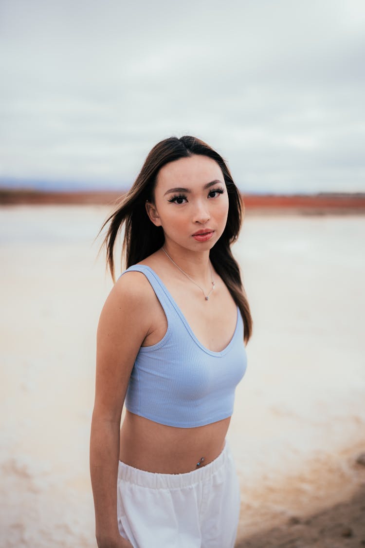 Young Woman Posing On Beach