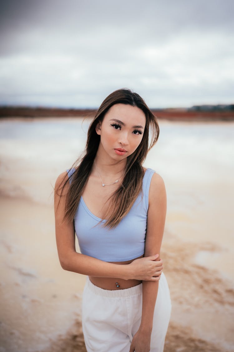 Young Beautiful Woman On The Beach 