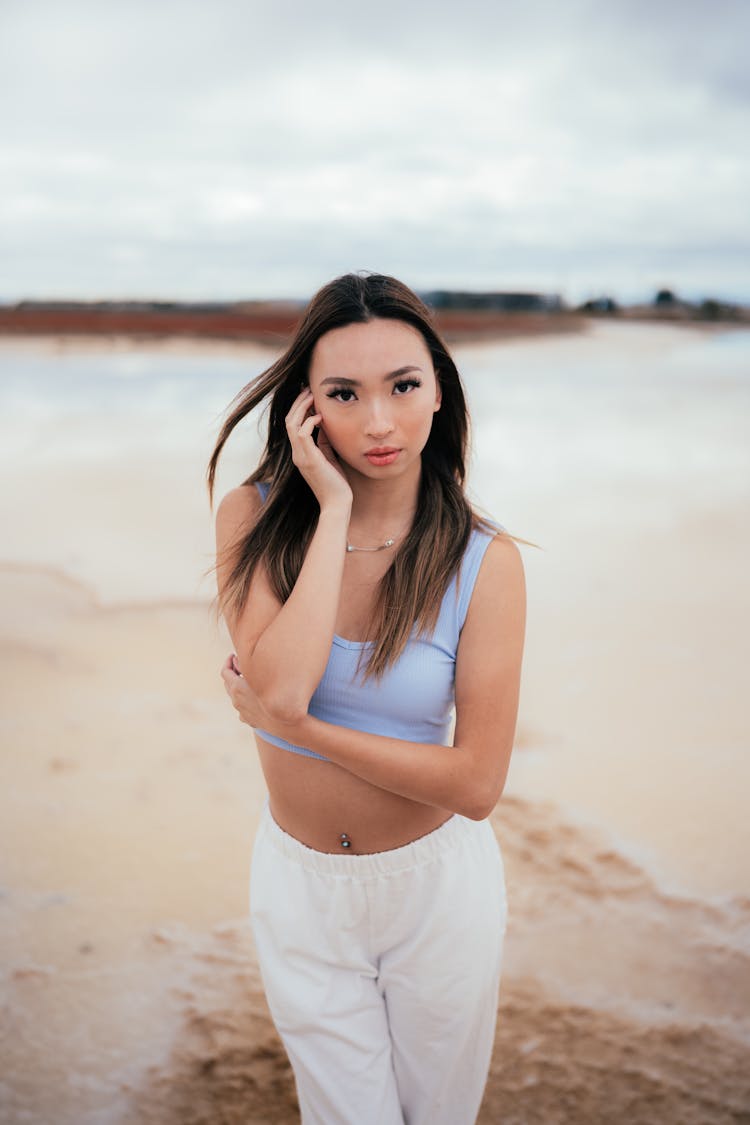 Young Beautiful Woman On The Beach 