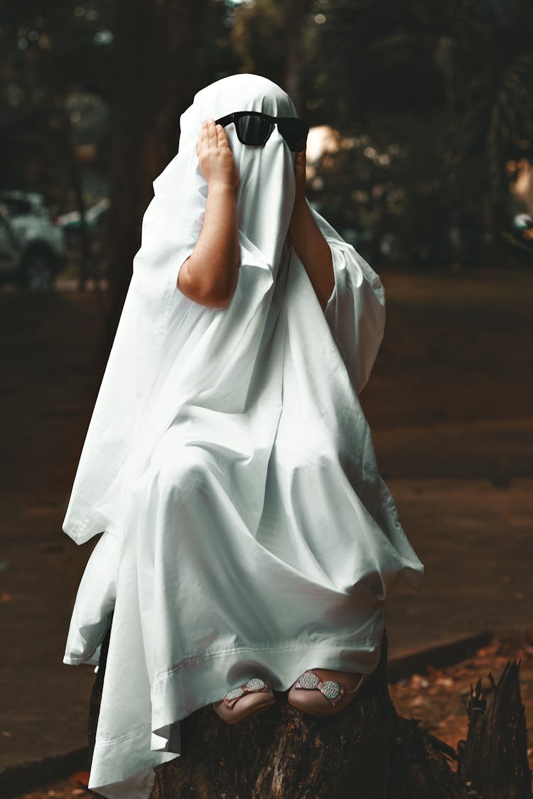 Photograph Of A Person Wearing A Ghost Costume