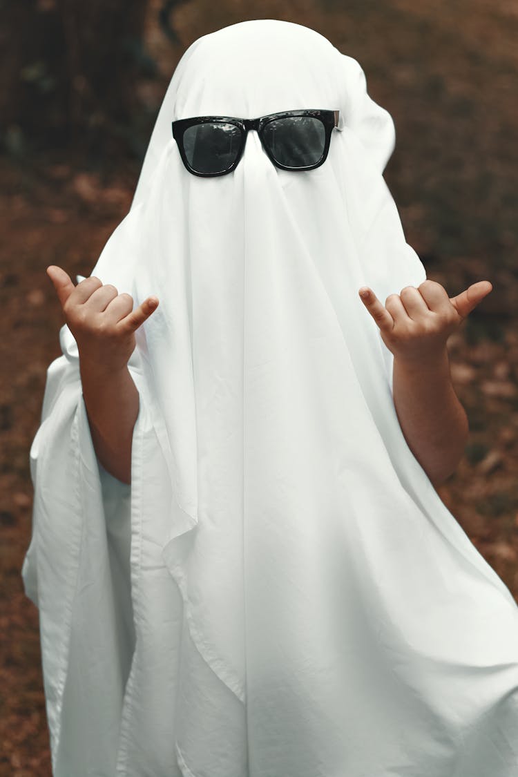 A Ghost Making A Hang Loose Sign