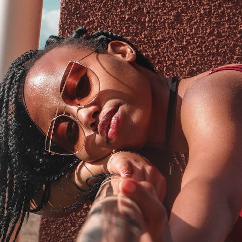 Close-Up Shot of a Woman With Sunglasses 