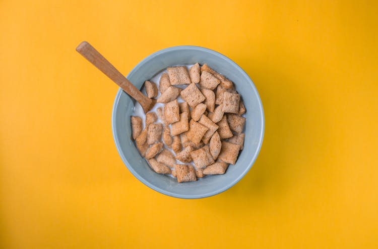 A Bowl Of Cereal With Milk