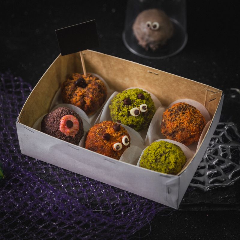 Halloween party food platter with themed snacks