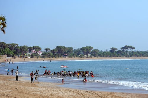 бесплатная Бесплатное стоковое фото с берег моря, лето, люди Стоковое фото