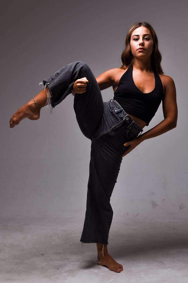 Woman Showing Dancing Moves In Studio