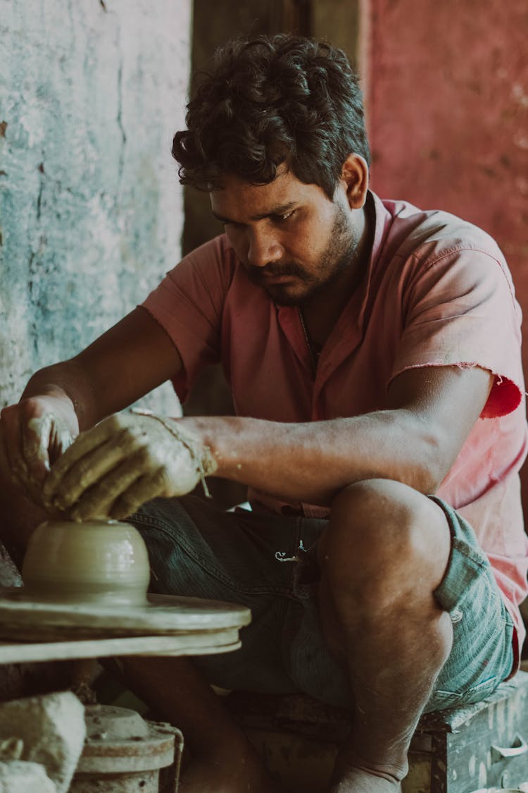 Man Making Clay Pot